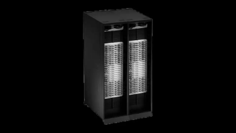 Black NVIDIA DGX Vera Rubin NVL72 rack cabinet with two columns of compute trays, shown in greyscale